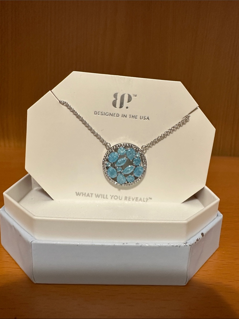 BP necklace. Main stone is lab created aquamarine ice crystals.